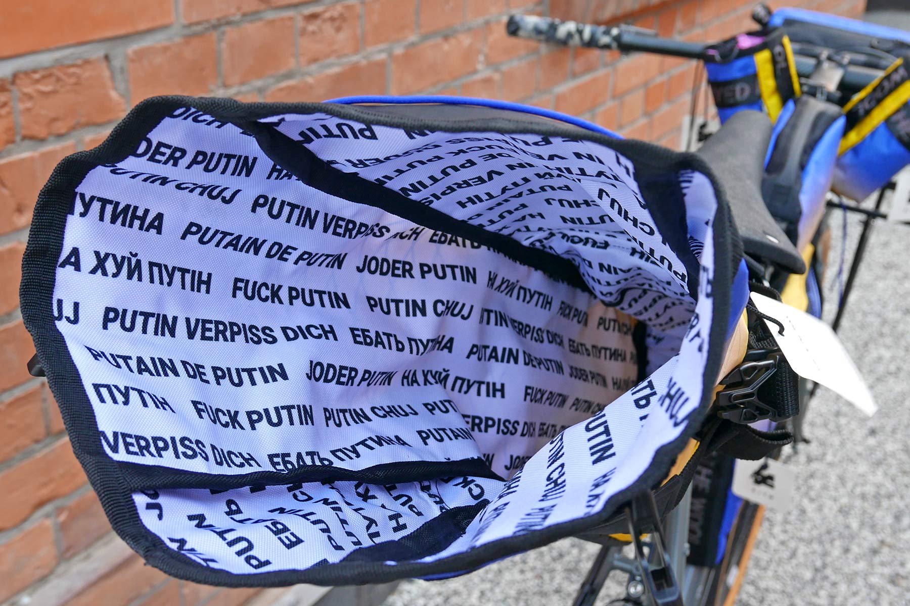 Dyed in the Wool BLB custom F*%k Putin bikepacking bag raffle for Ukraine, inside message