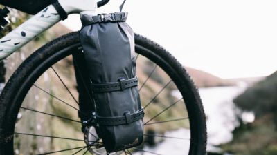 Tailfin Cage Pack System adds a new hook to dry bag bikepacking storage