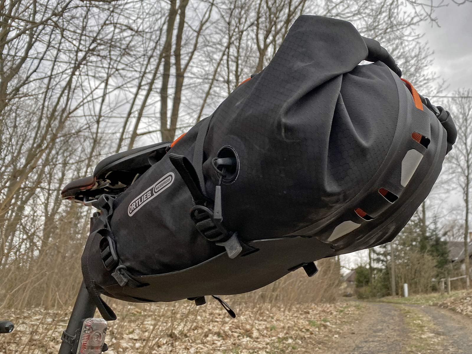 Ortlieb Seat-Pack QR, off-road secure quick-release bikepacking saddlebag Review, rear with tire protection