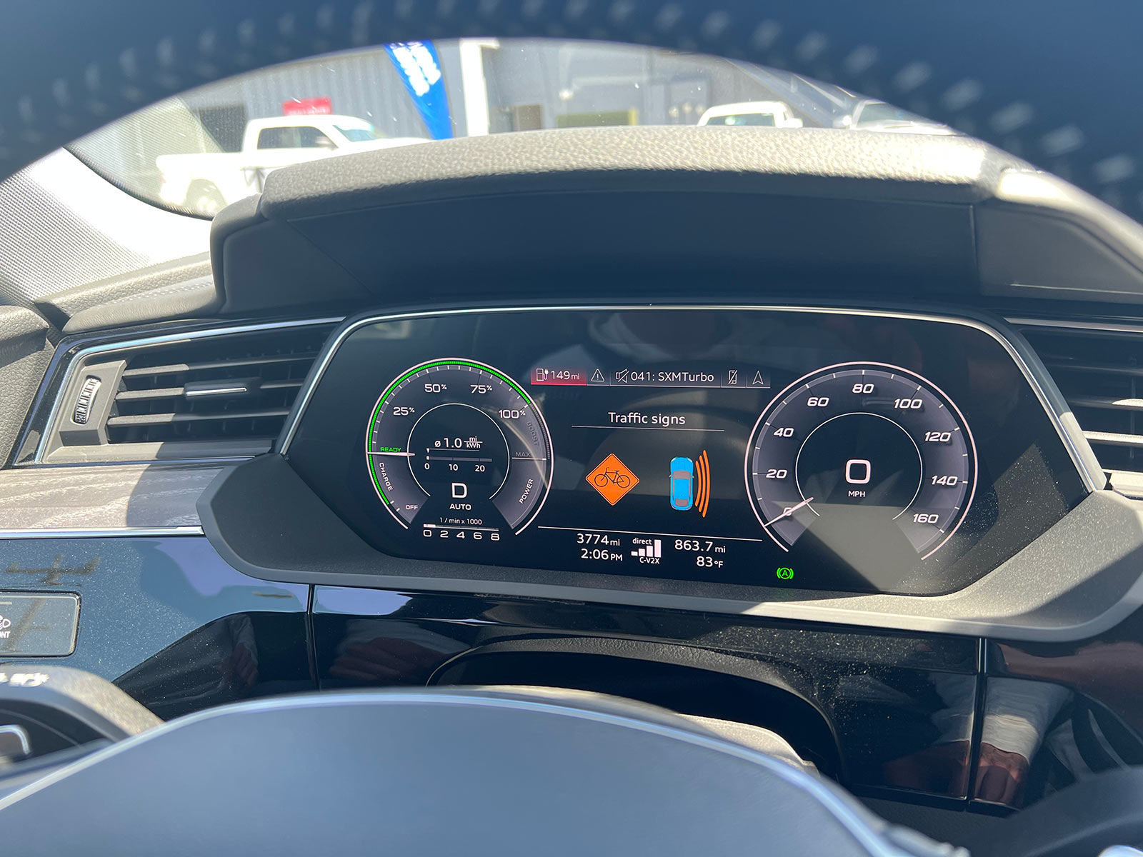spoke C-V2X car to bicycle safety tech shown on dash of audi