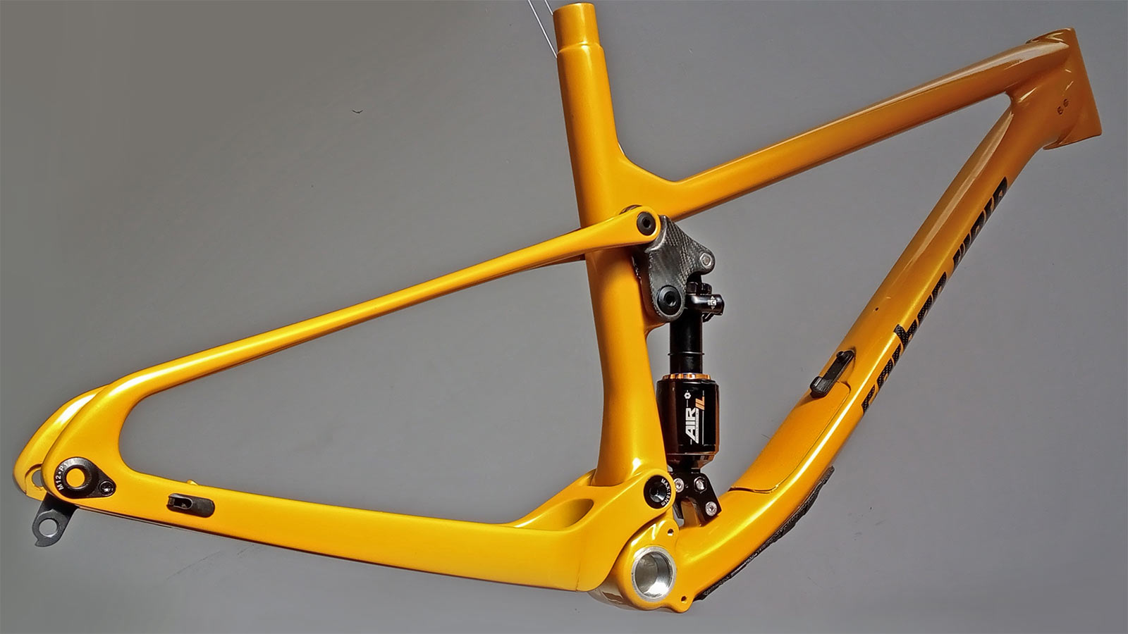 Carbon Wasp Truffle 120mm trail bike, short-travel UK-made carbon mountain bike, frameset angled