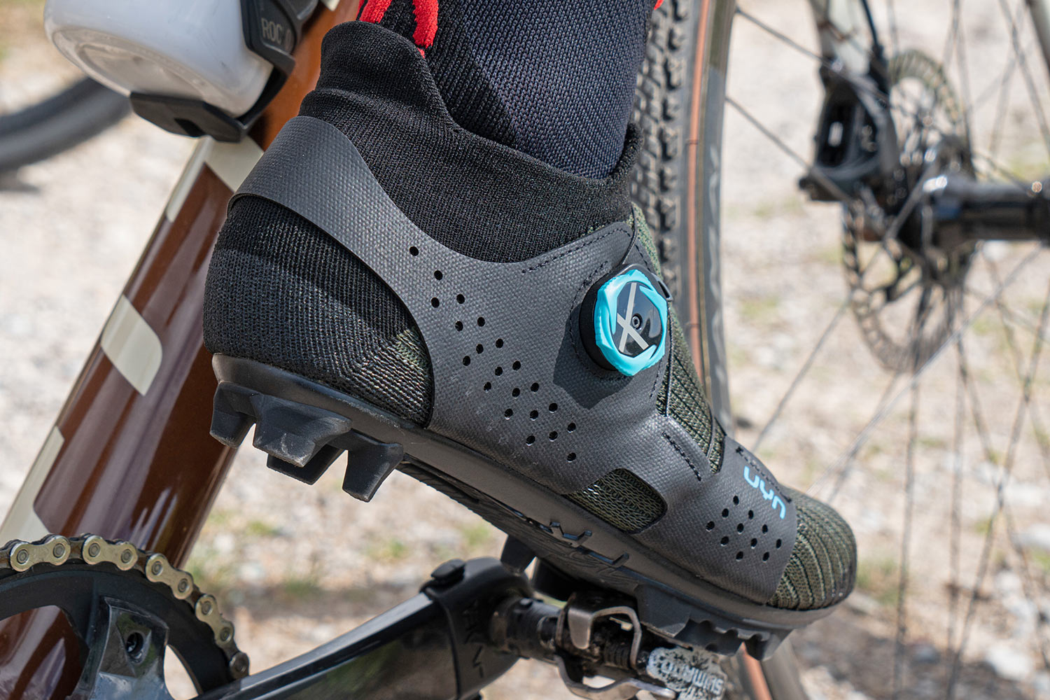UYN Naked MTB shoes, natural fiber recycled sock-like breathable knit off-road cycling shoe, photo by Mattia Ragni, angled rear