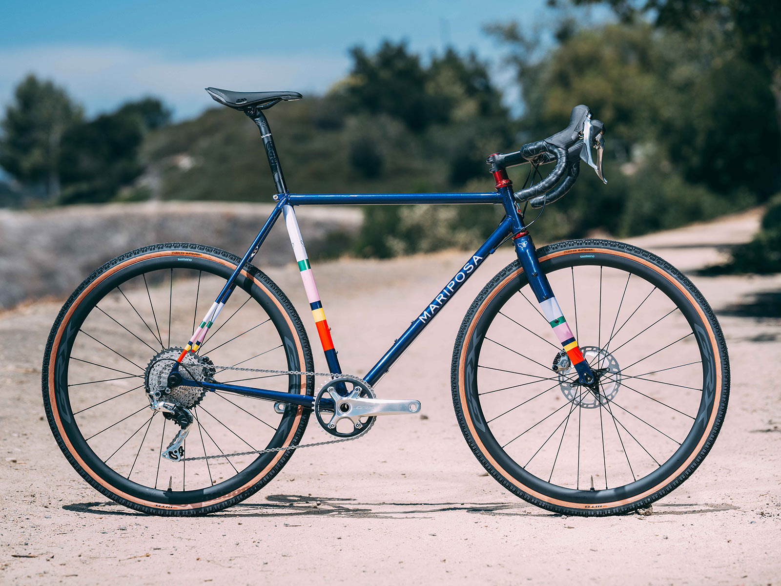 mariposa custom steel gravel bike with shimano grx limited polished silver components