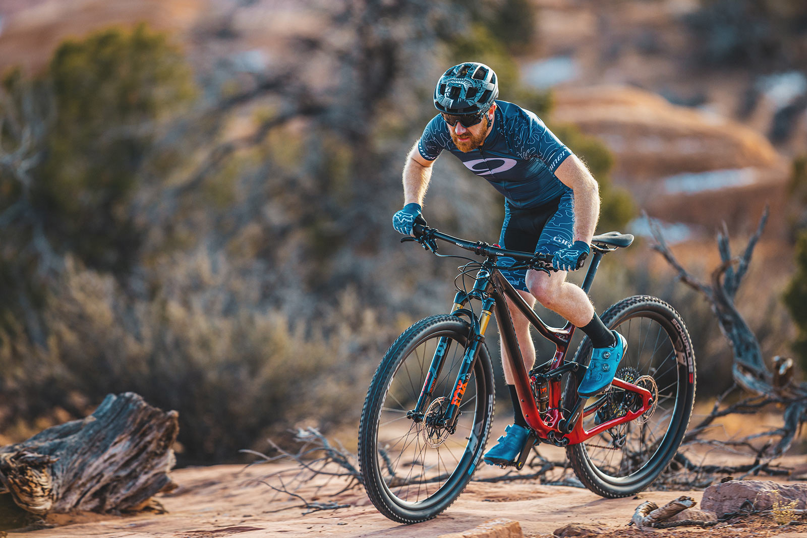 guy riding the 2023 niner RKT RDO mountain bike