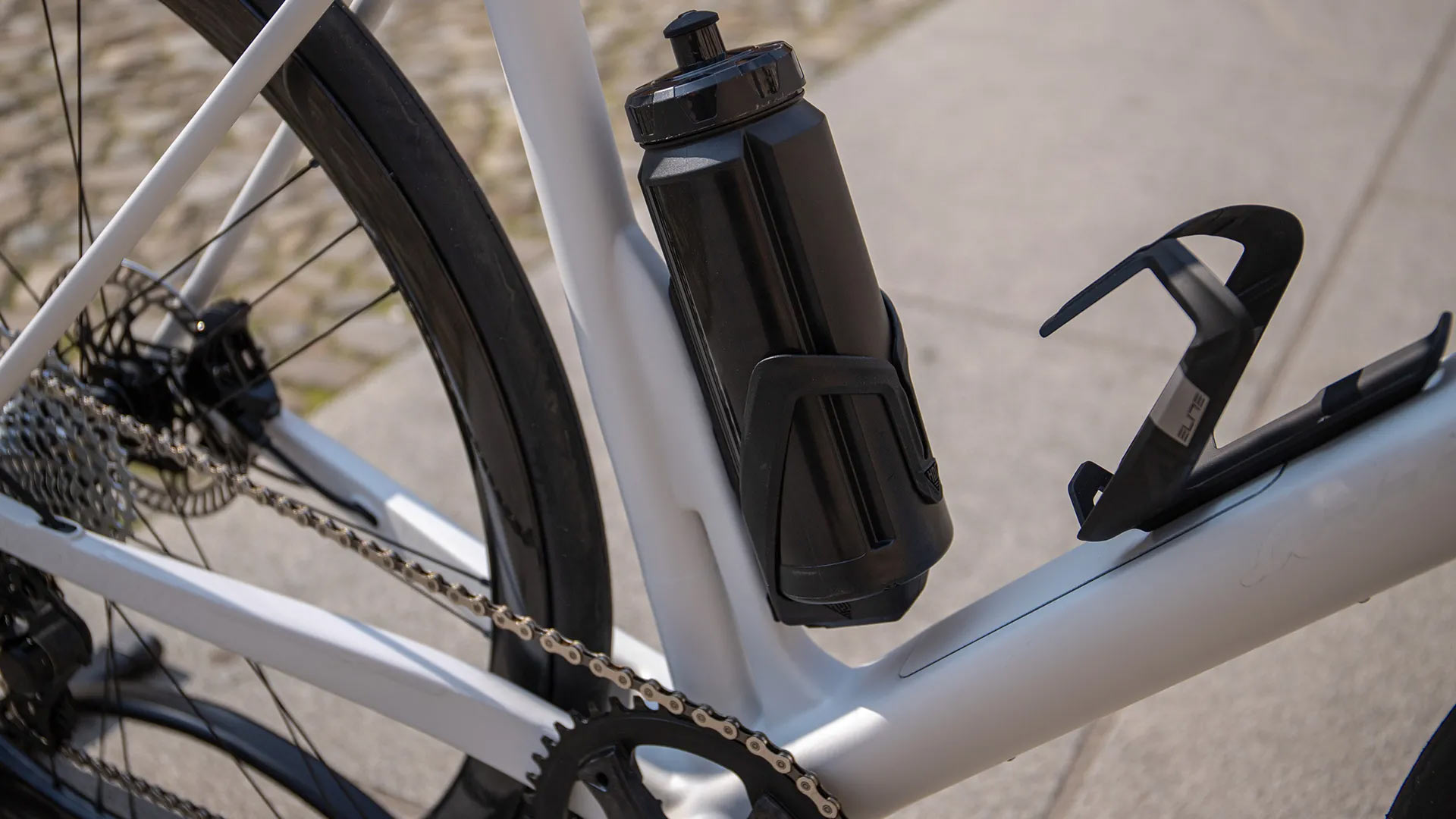 closeup of water bottle battery on ares aero road bike with hidden HPS motor