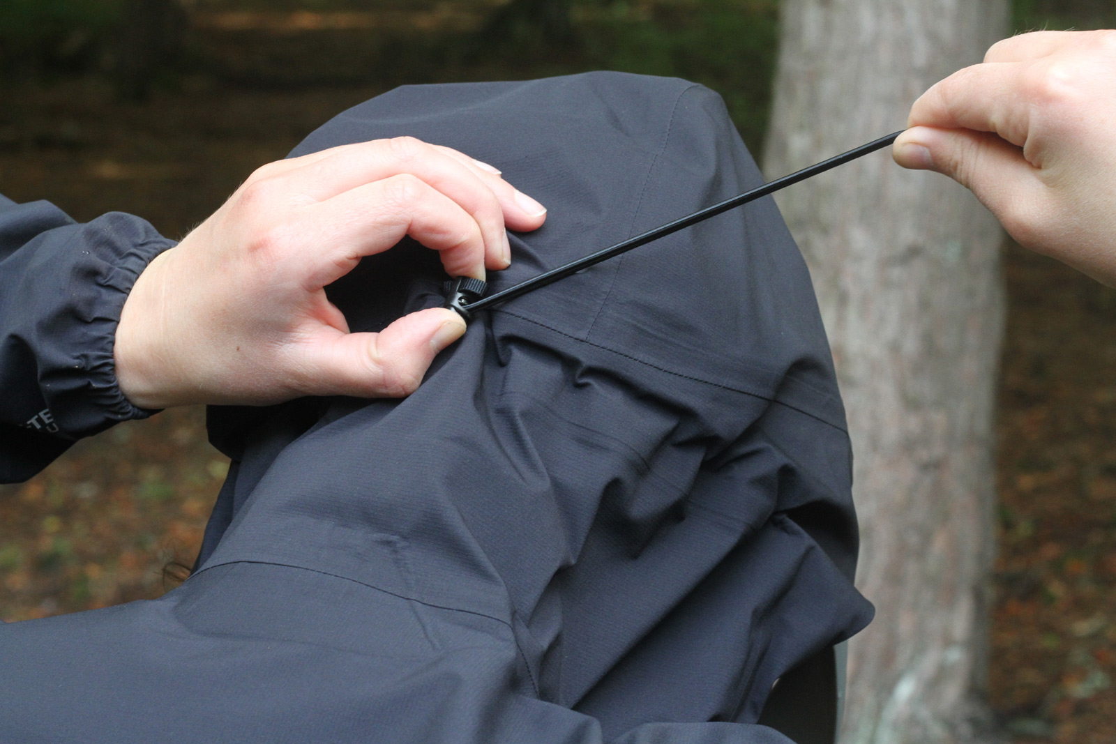 Rapha Gore-Tex Infinium Trail Hybrid Jacket review hood elasticated draw cord cinches down