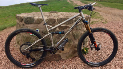 Perry Habu re-thinks the Trail Bike with Single-Pivot Titanium Frame