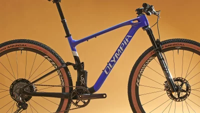 Olympia F1-X Hides a Rear Shock Partially Inside its All-New Carbon XC MTB Frame