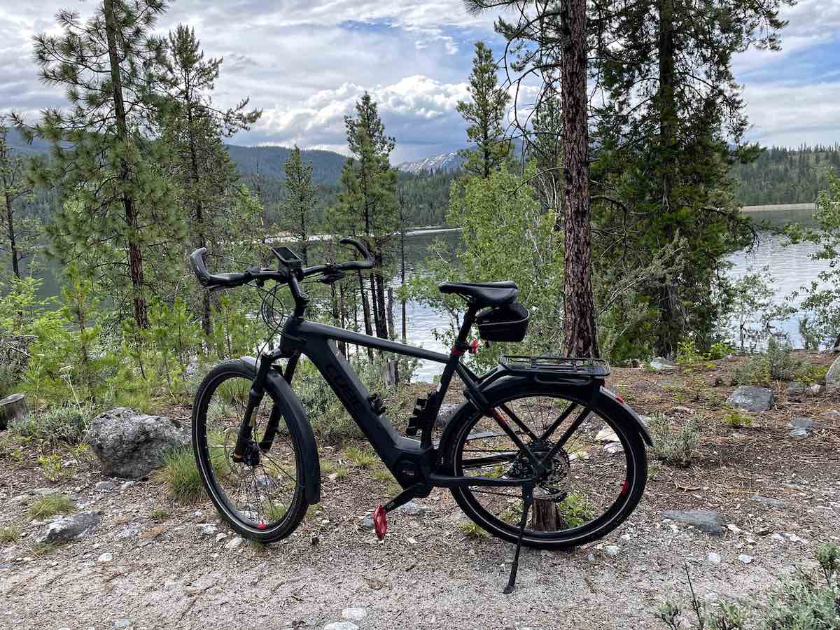 bikerumor pic of the day a bicycle is on a dirt path on the edge of a lake