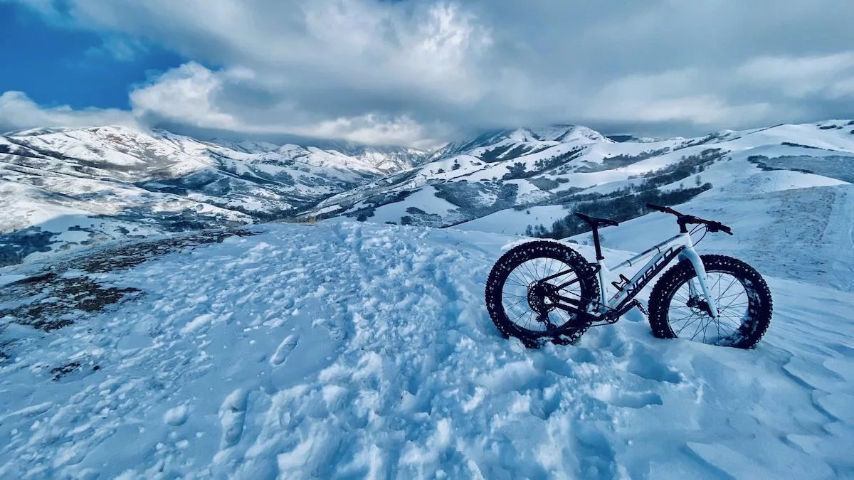 bikerumor pic of the day a fat bike is in snow on top of a mountain range
