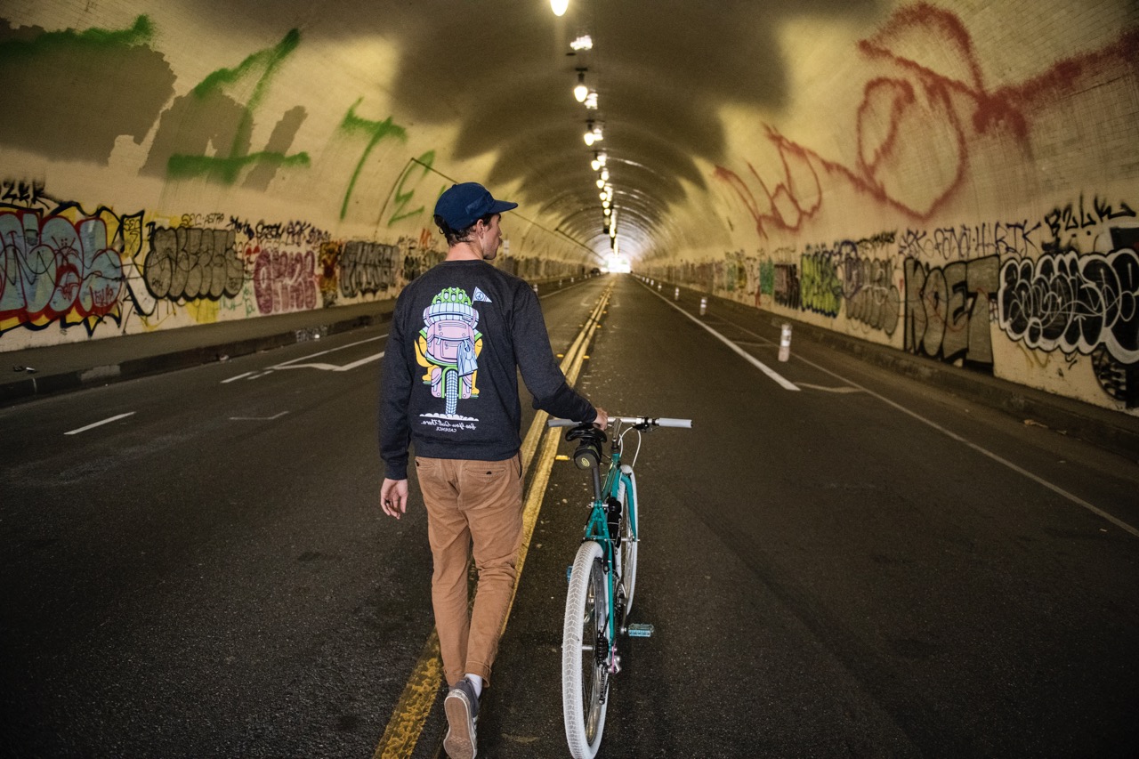 Cadence Collection Breakaway Collection walking bike in tunnel