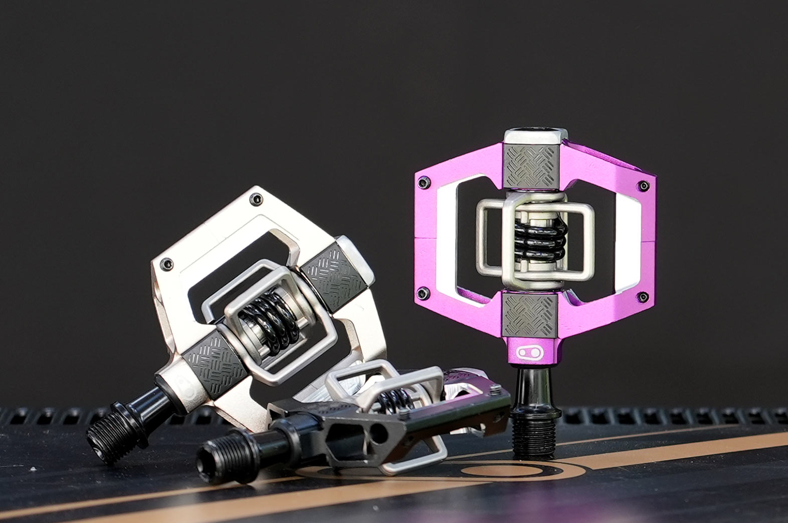 Crankbrothers Mallet Trail Pedal shown in three colors