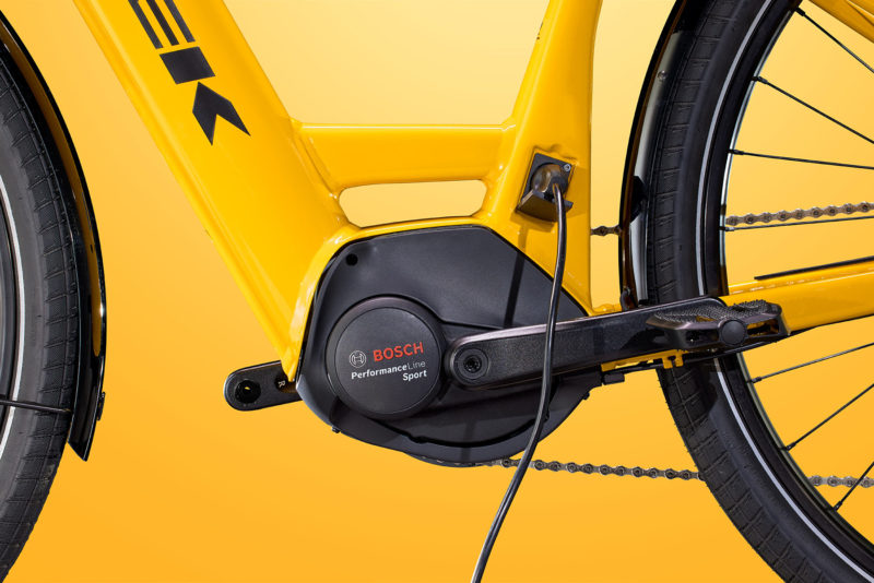 closeup details of Trek Verve+ 4S electric commuter bike motor and charging port