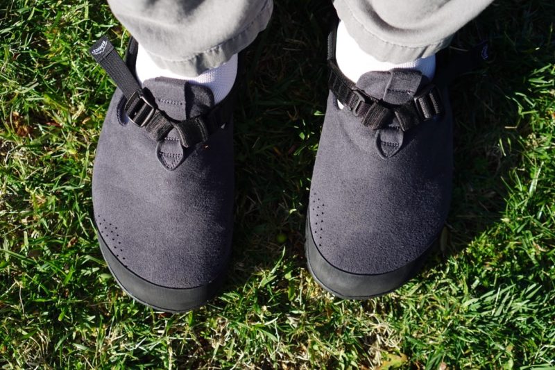 Bedrock Mountain Clogs on the feet in the grass