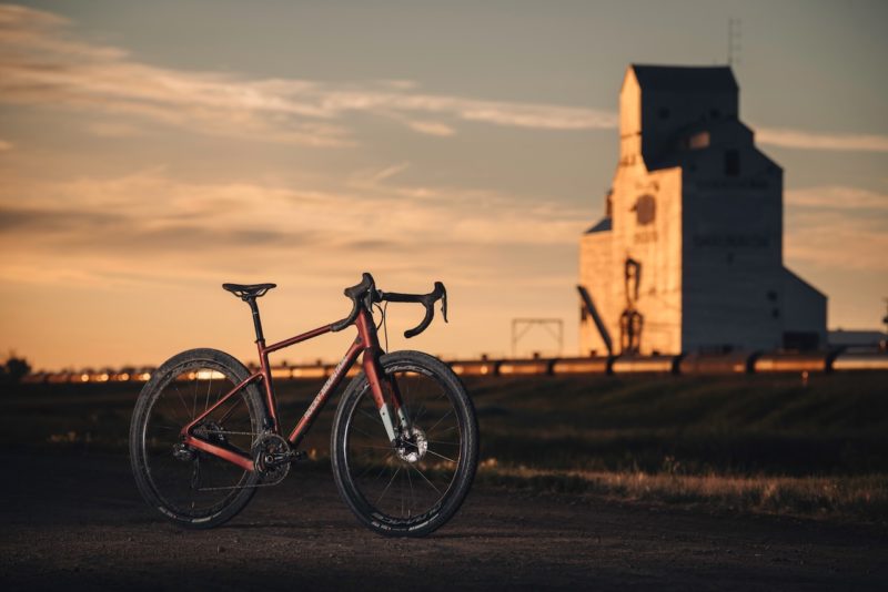 Rocky Mountain Solo Gravel Carbon Alloy with building in the background