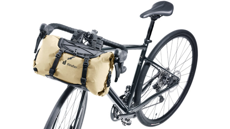 a deuter handlebar bag attached to a gravel bike