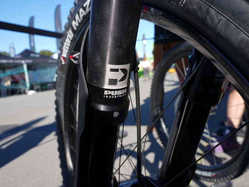 closeup details of prototype push industries inverted suspension fork for trail and enduro mountain bikes