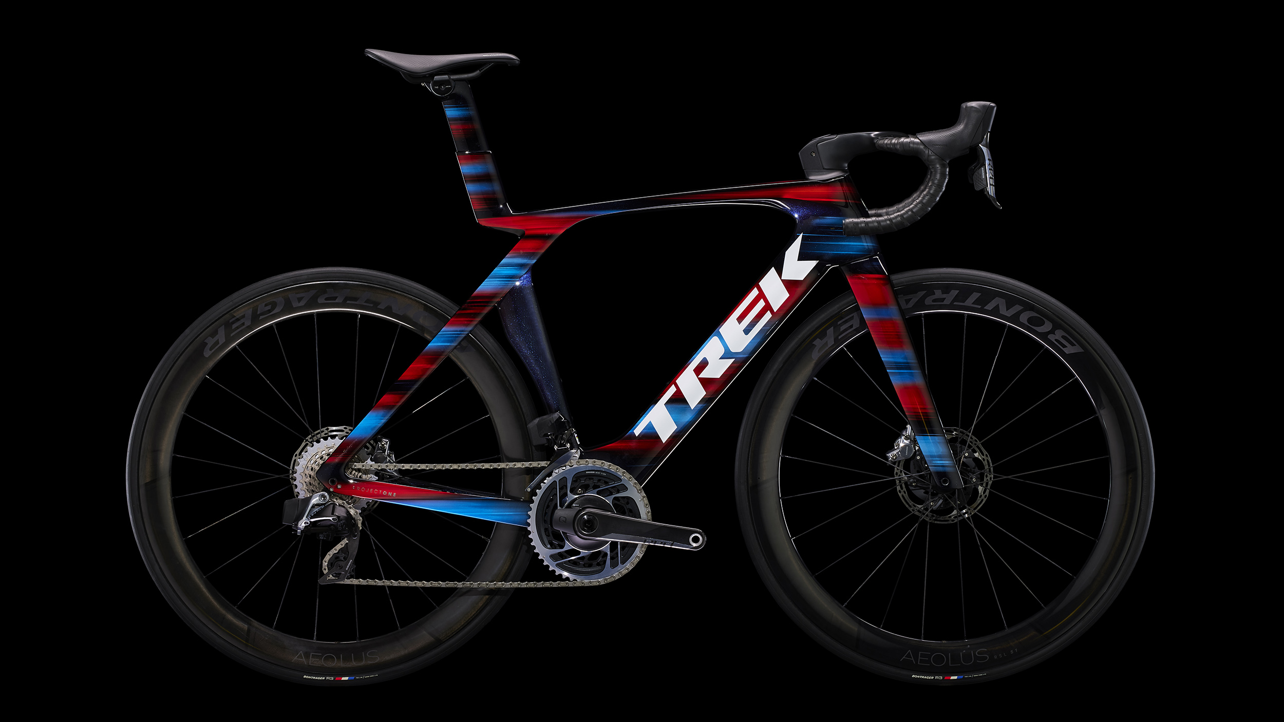 a red, blue, and black striped bike against a black background