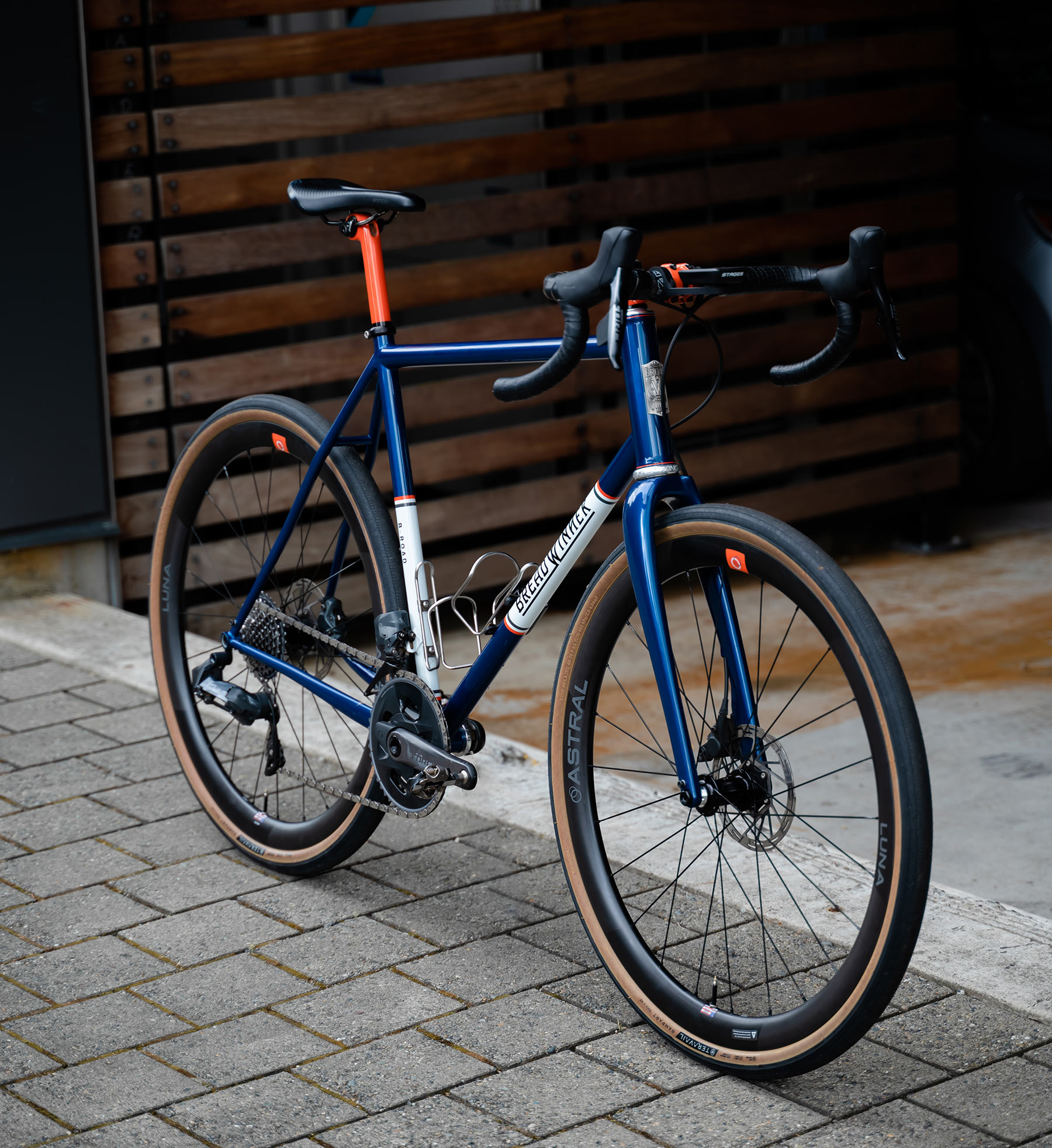 astral luna carbon all-road wheels shown on a bike