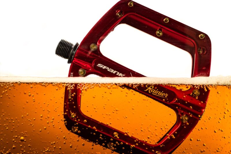 Spank x Rainier collab red pedal in beer