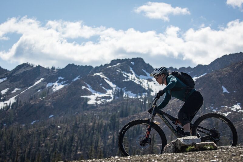 Spank x Rainier collab riding on a mountain