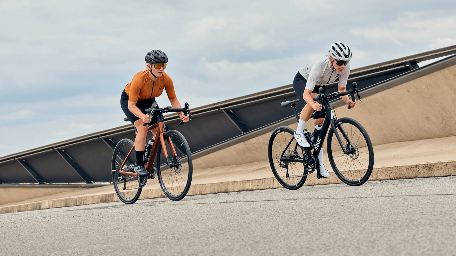 2023 Rose Reveal AL modern affordable alloy road bike, riding uphill