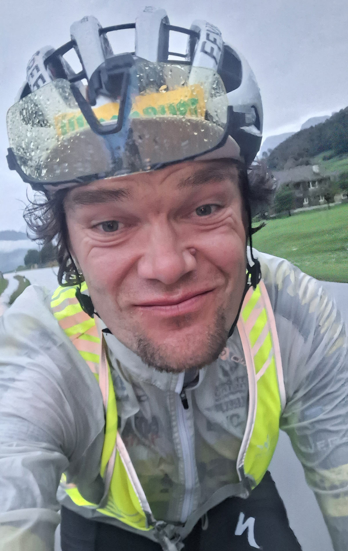 Apidura Packable Visibility Vest, fitted hi-viz vest for road cycling, Christoph Strasser Transcontinental TCRNo9 winner, rainy selfie