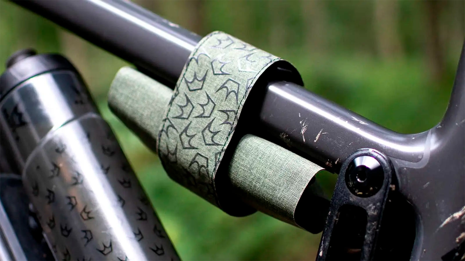 peaty's holdfast trail tool wrap shown on a bike