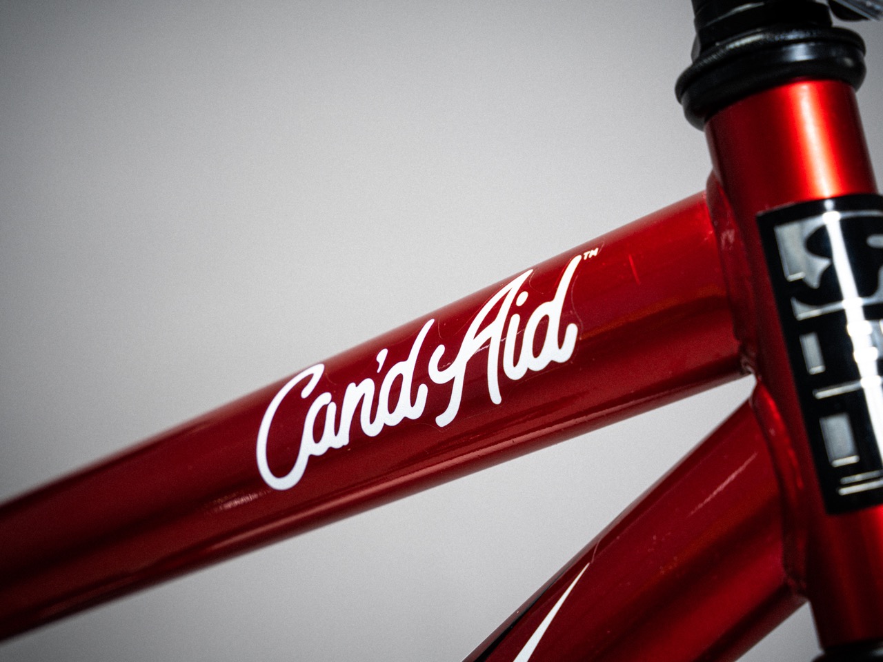 Can'd Aid GoGo Bike top tube logo