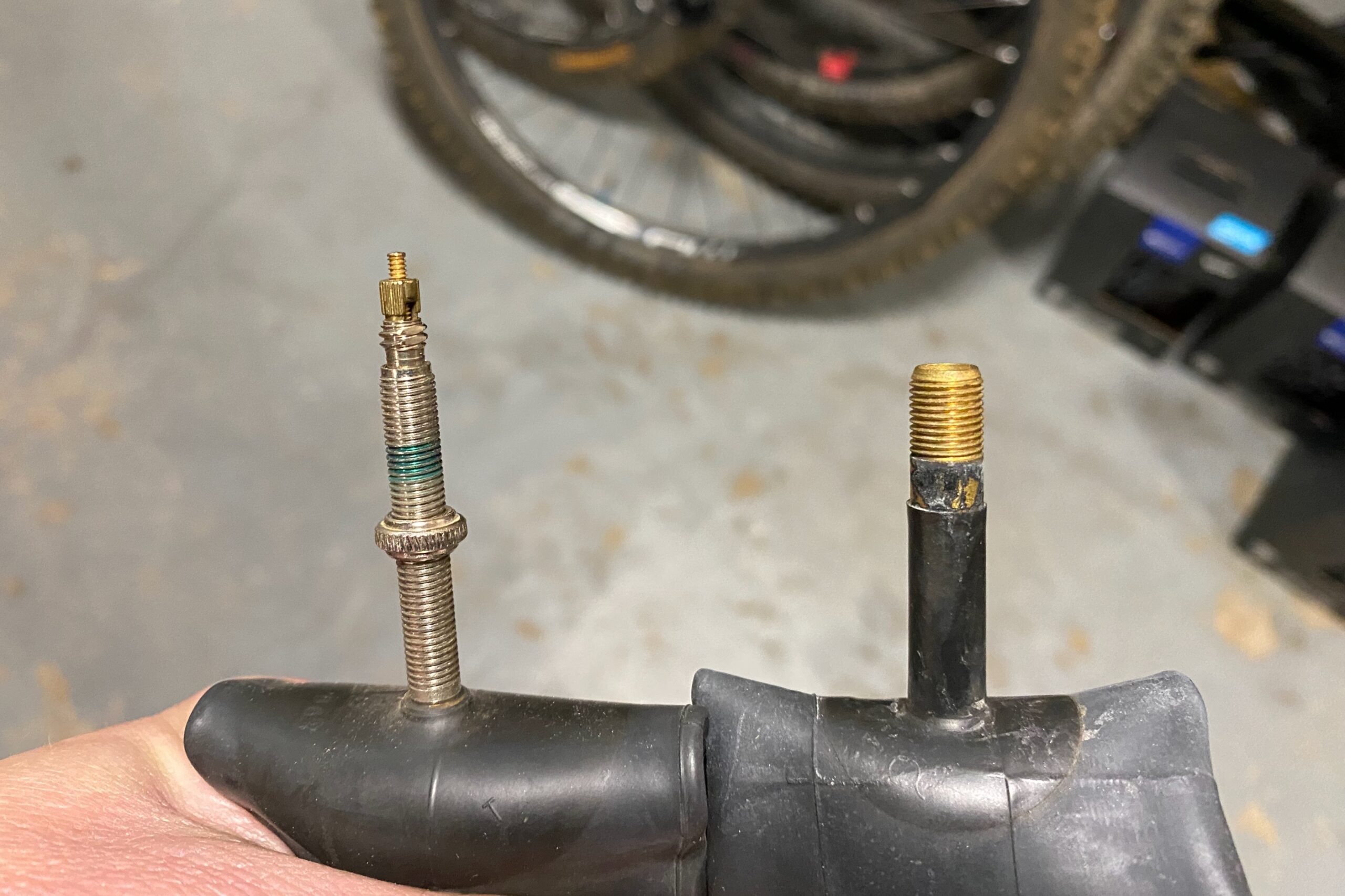 Side by side photo of Presta and Schrader valves for comparison