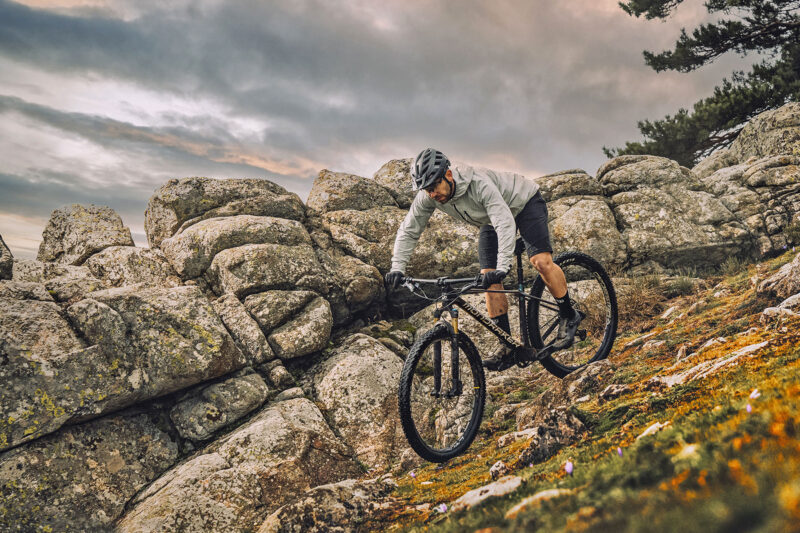 2024 Mondraker Chrono Carbon DC progressive downcountry hardtail mountain bike, riding in the backcountry