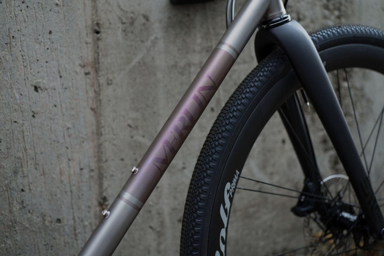 downtube anodized graphics on merlin sandstone XLG titanium gravel allroad bike