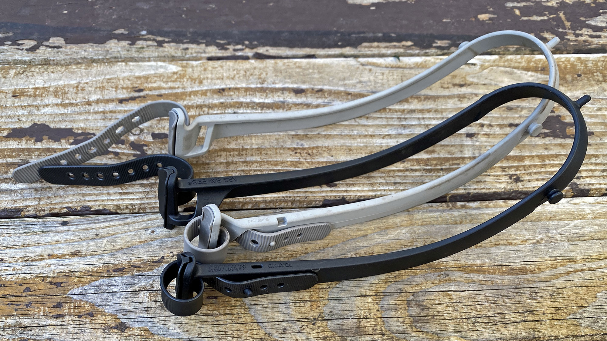 Ass Savers Win Wing 2 updated and improved strap-on gravel bike fender, old vs. new wishbones