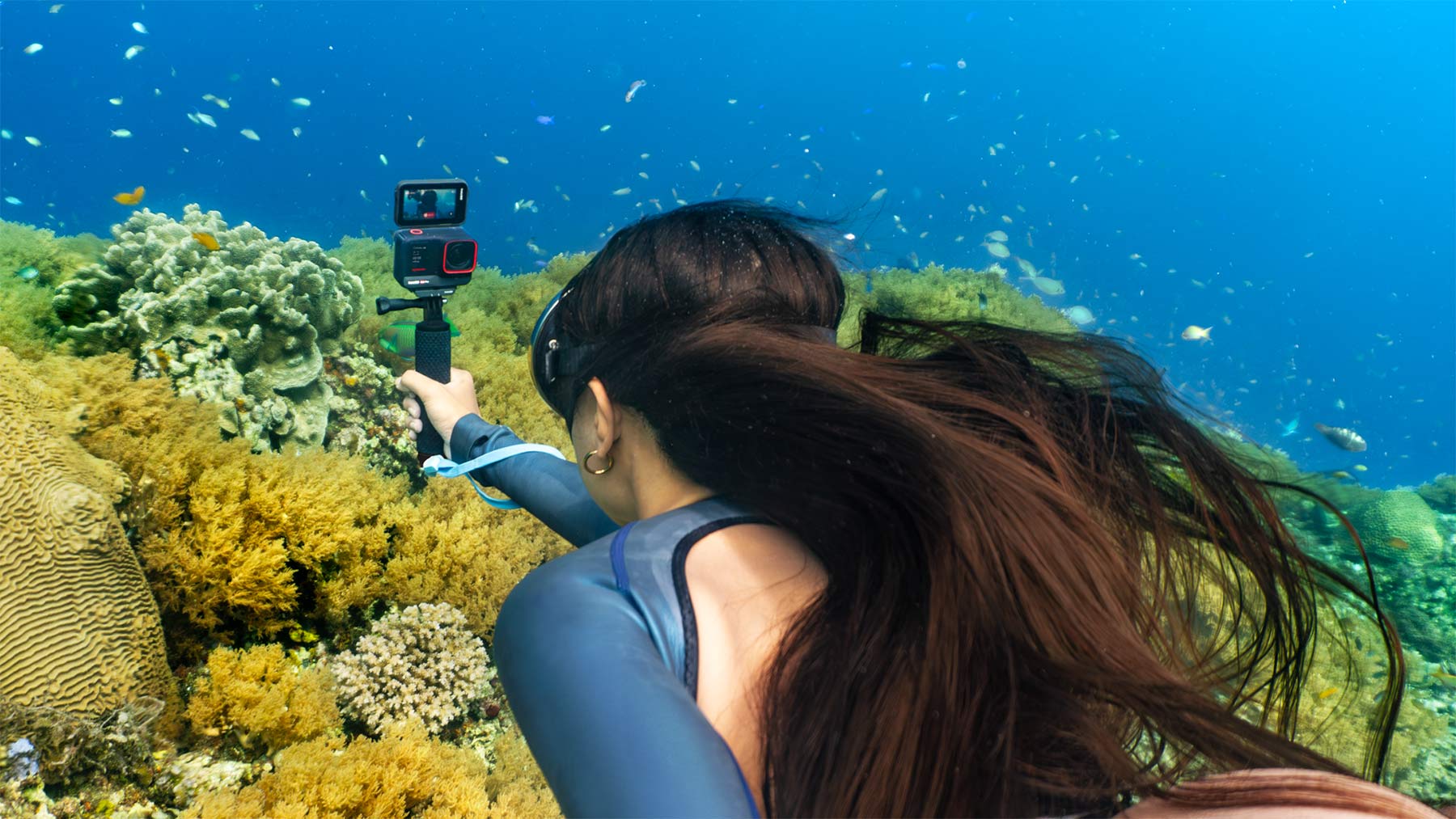 insta360 ace pro action camera underwater with diver