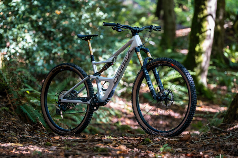 Orbea Occam SL bicycle standing in the woods.