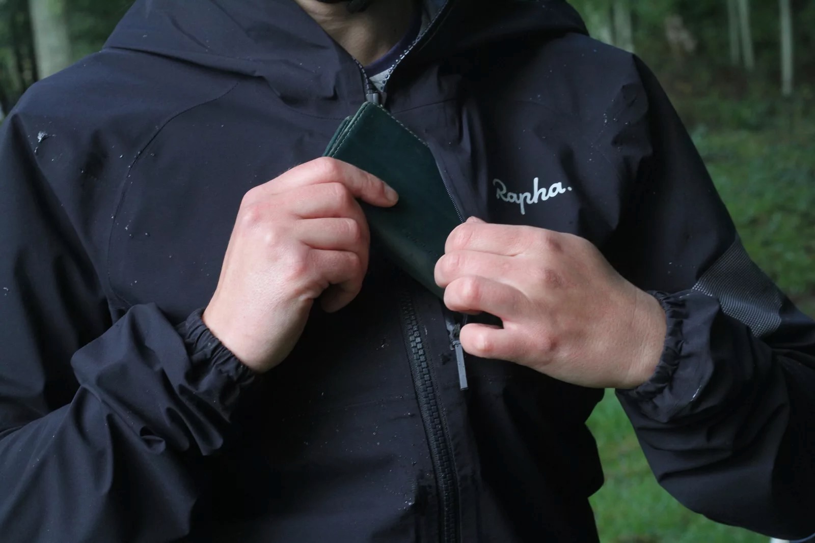 Putting a phone in the chest pocket of the Rapha Gore-Tex Infinium jacket
