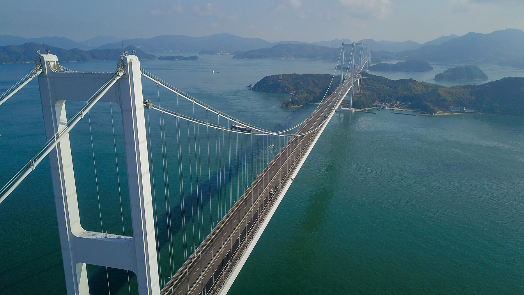 Κρεμαστές γέφυρες Shimanani Kaido στη Σκηνή Σικόκου και τον Ερευνητικό Κύκλο Ποδηλασίας Σαμουράι της Ιαπωνίας τον Μάιο και τον Οκτώβριο