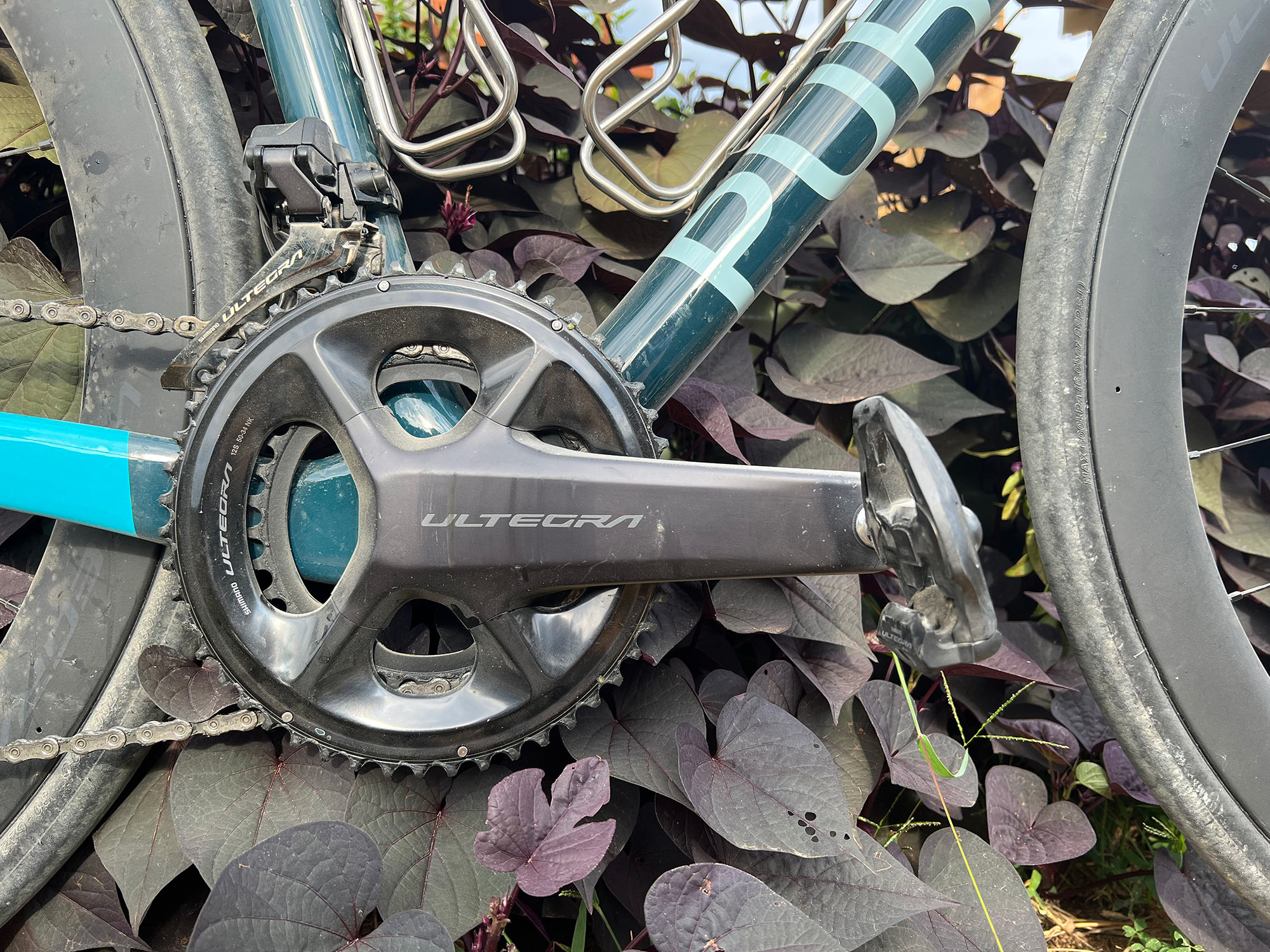 closeup details of shimano ultegra R8100 12-speed road bike crankset