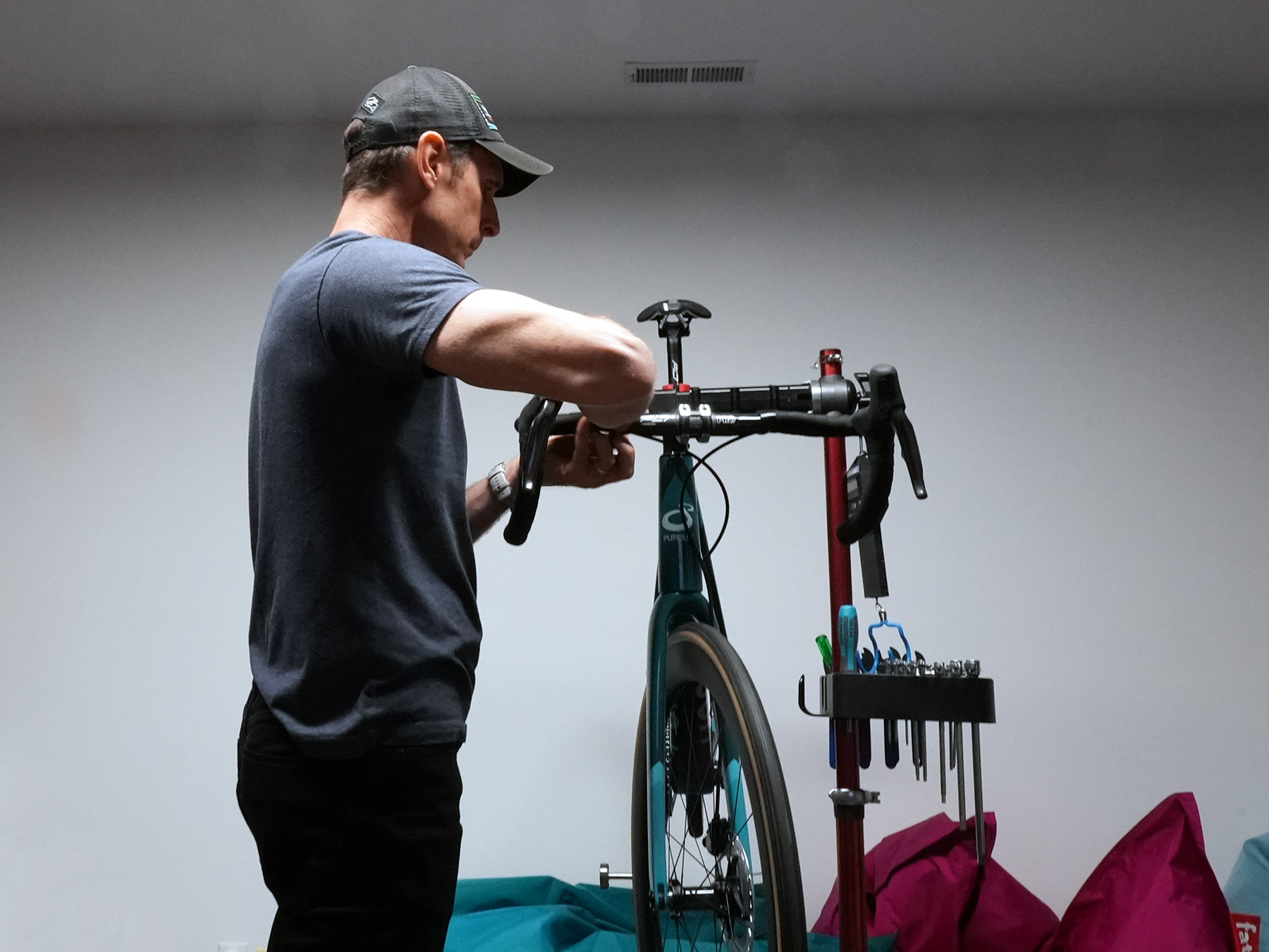 tyler working on a road bike with shimano ultegra