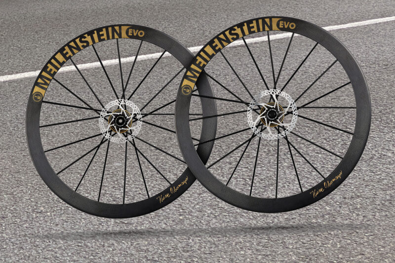 Lightweight Meilenstein EVO Signature Edition Gold carbon road wheels, on asphalt
