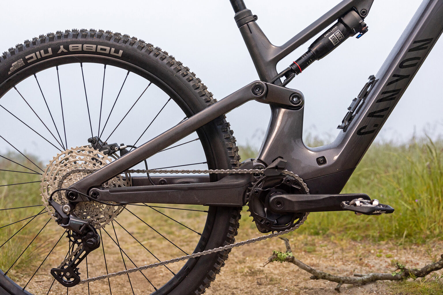 Canyon Neuron:ONfly lightweight 140mm carbon trail ebike with Bosch SX motor, rear triangle drivetrain detail