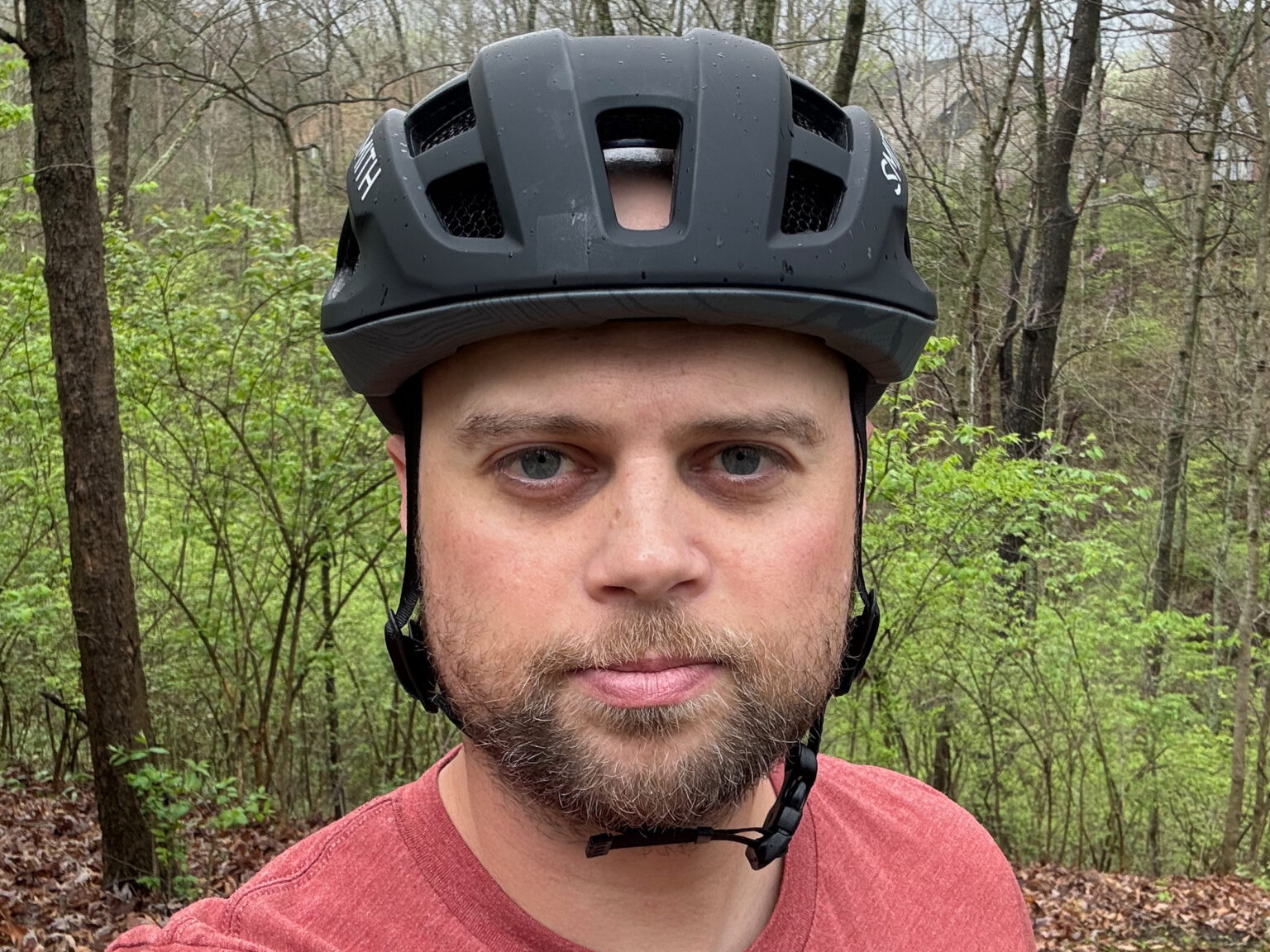 wearing Smith Triad road gravel helmet with Aleck crash sensor