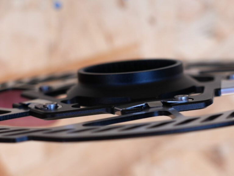Zeno's ReactionEX Floating Brake Rotor uses Tiny Leaf Springs - Bikerumor
