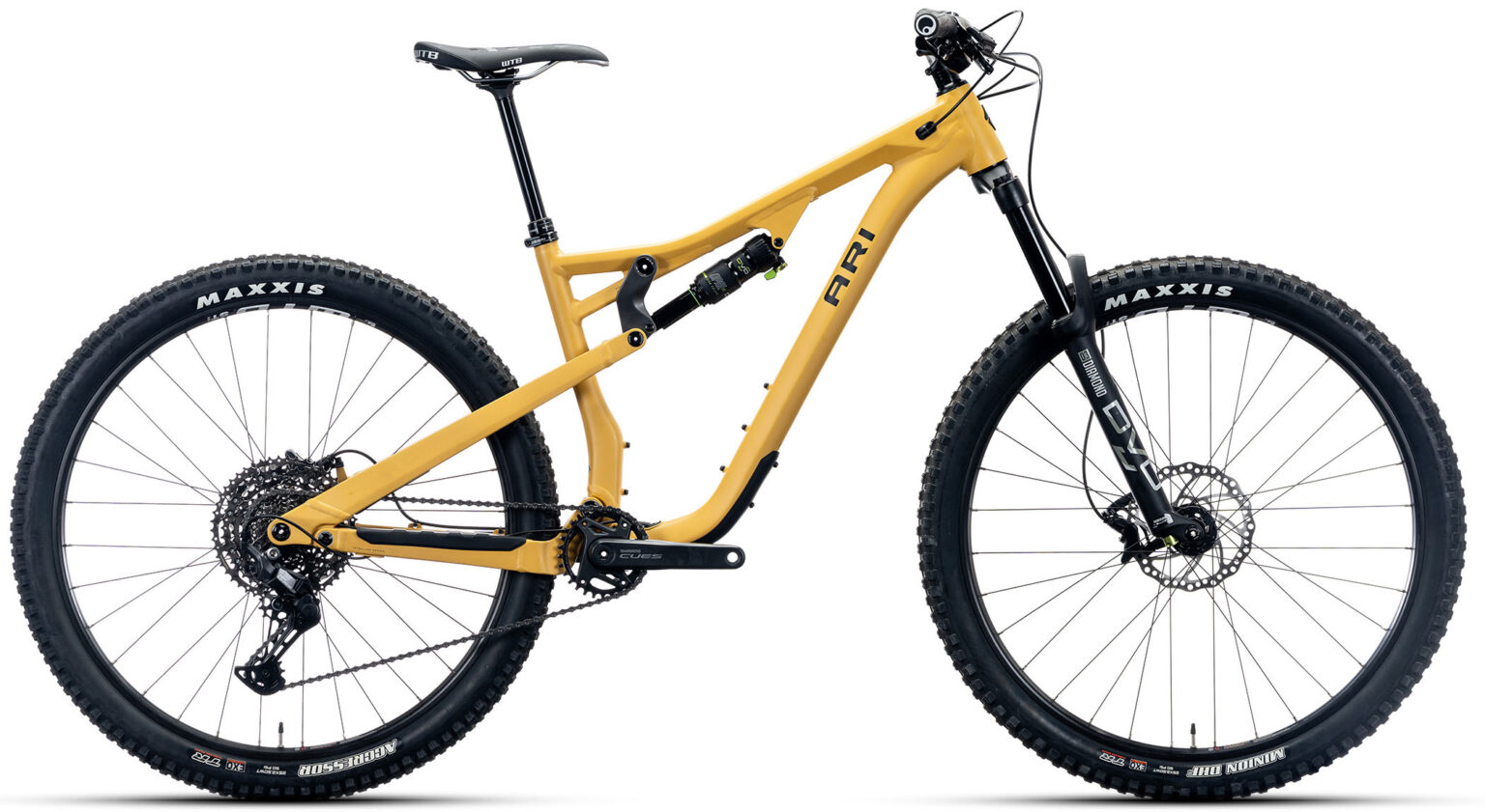 ari cascade alloy trail bike shown from the side in mustard yellow color