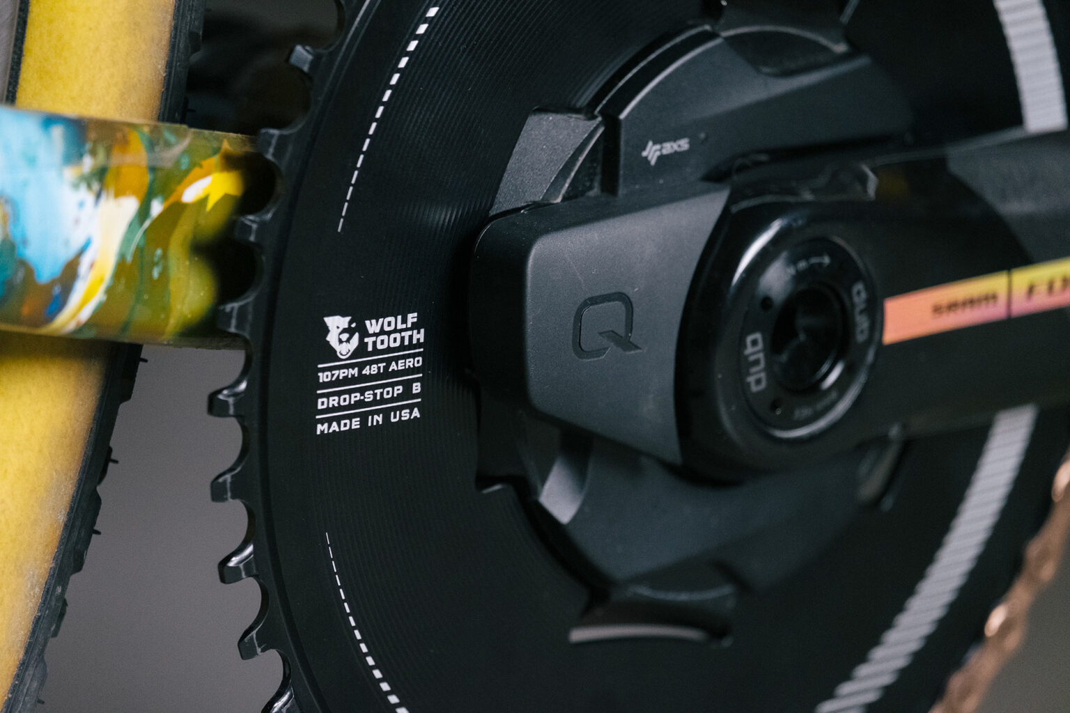 closeup details of wolf tooth components aero chainring for sram cranks