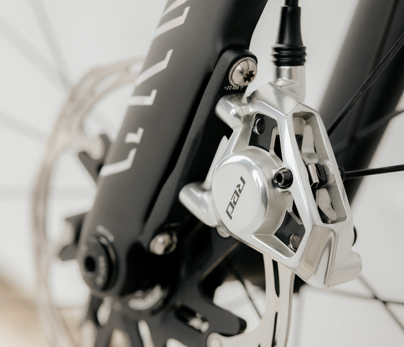 closeup of new SRAM RED AXS 2x road group brake caliper.