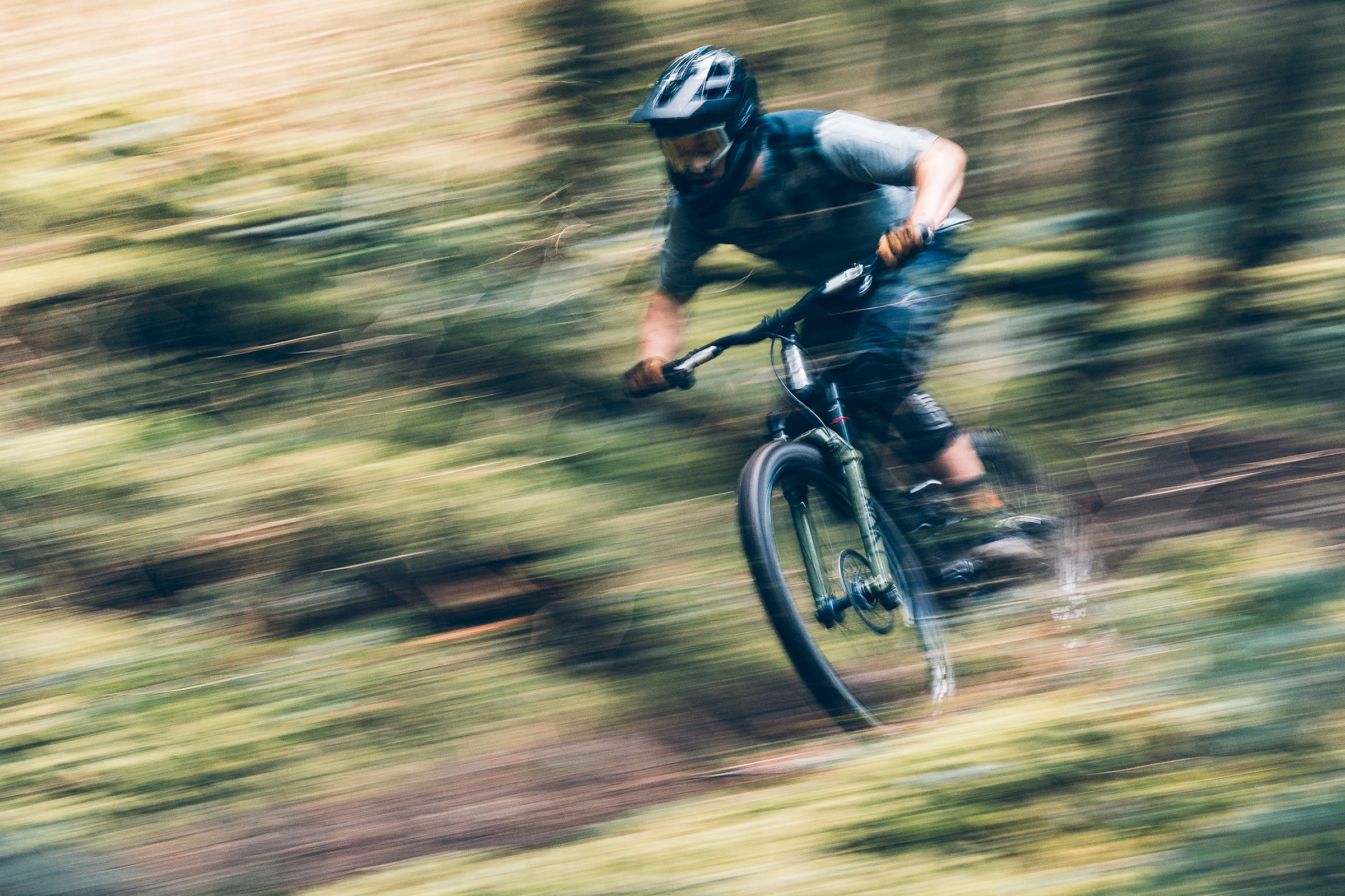 2025 rockshox lyrik fork being ridden fast on a trail.