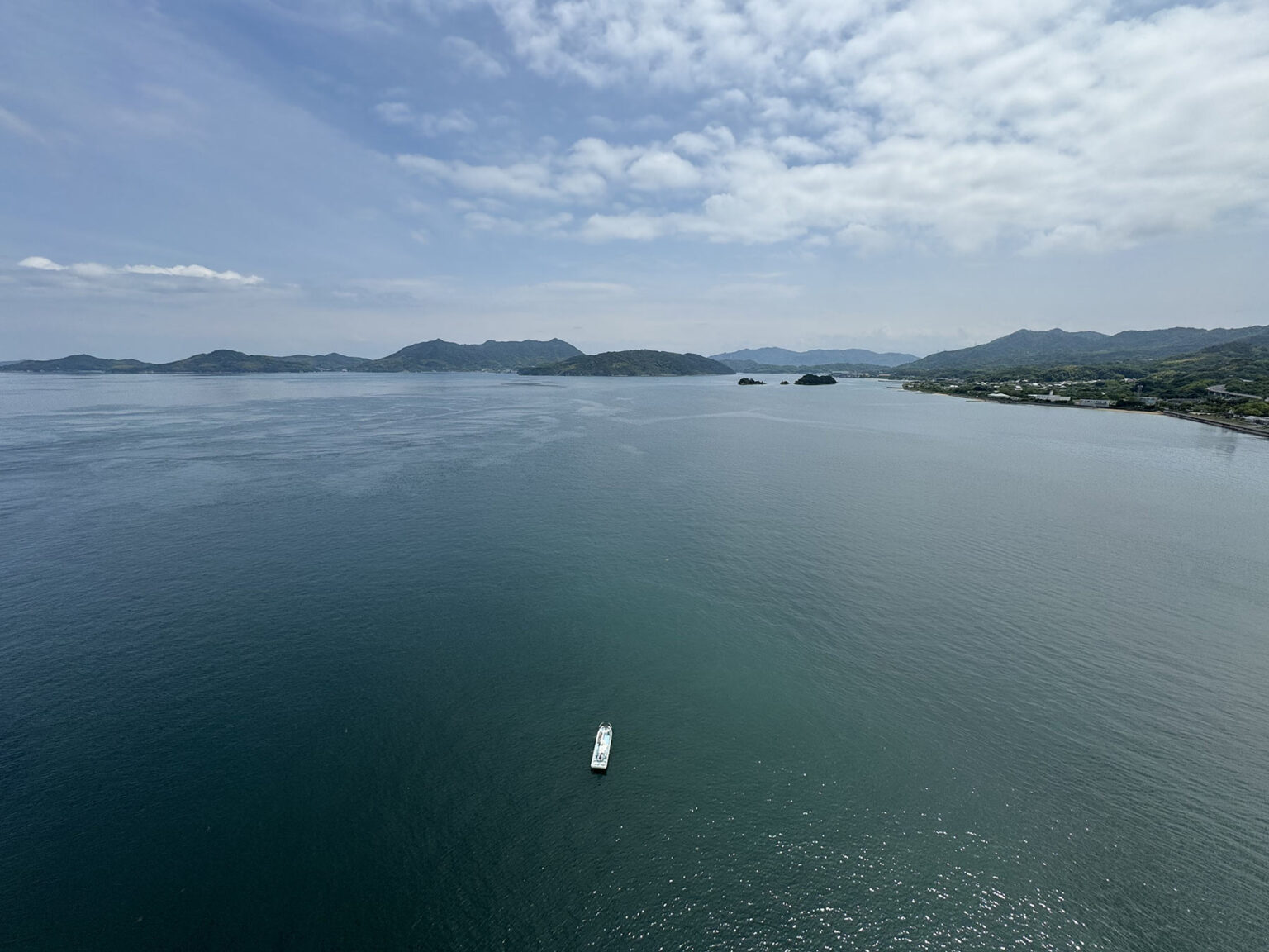 view of a boat from a bridge.