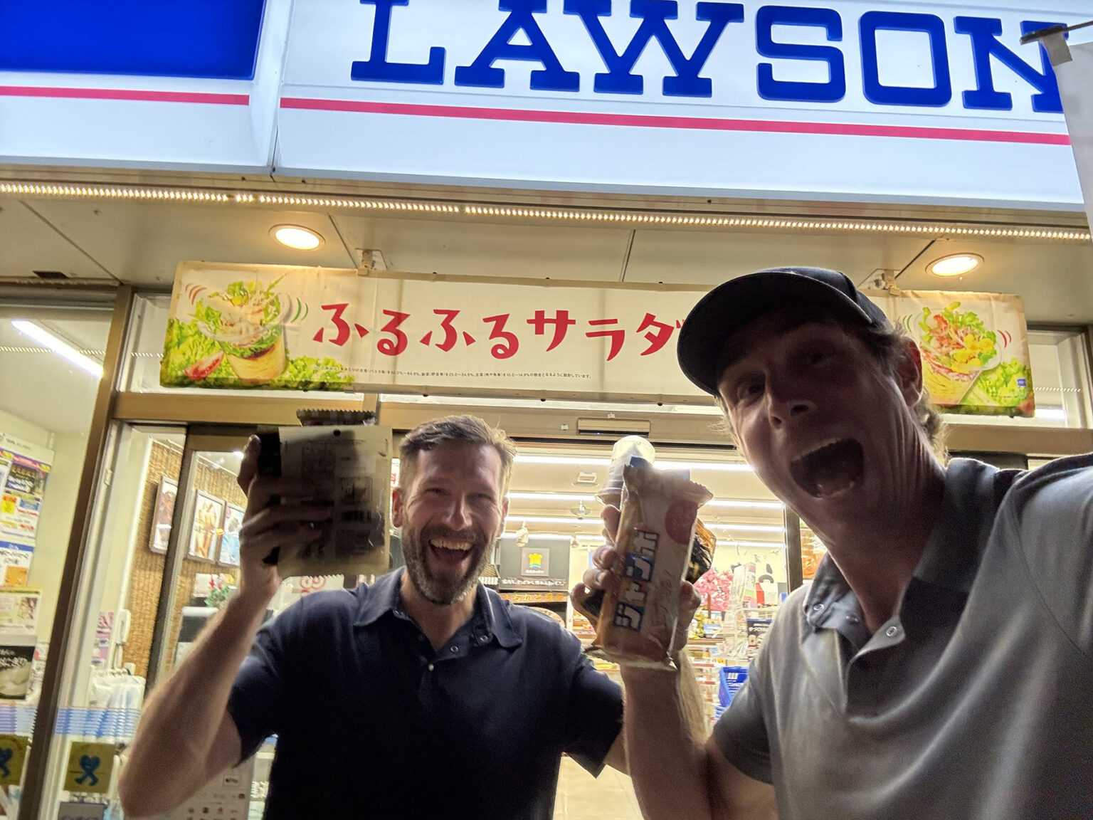 tyler and steve holding ice cream treats from lawsons.