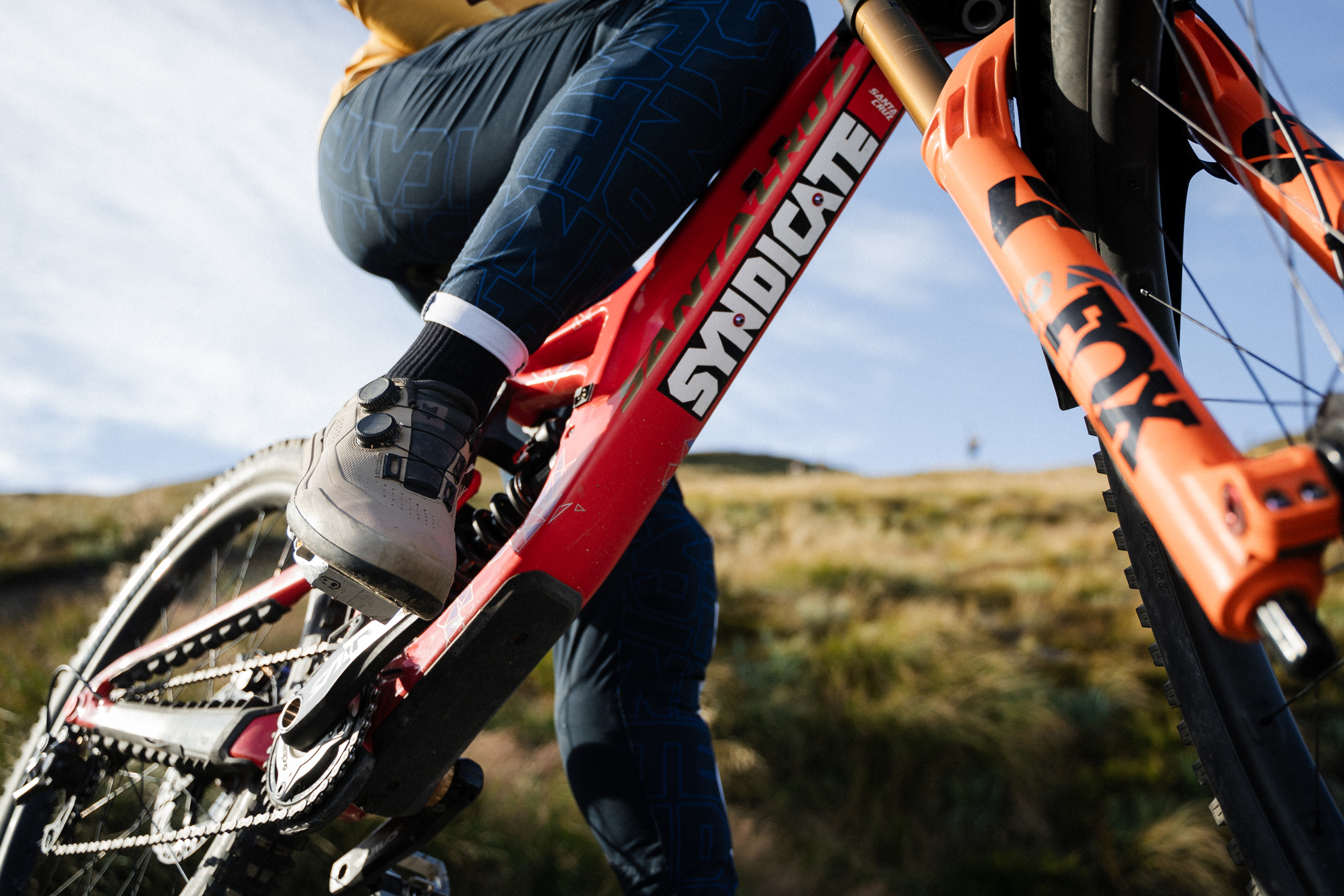 A mountain biker wearing shoes with BOA dials.